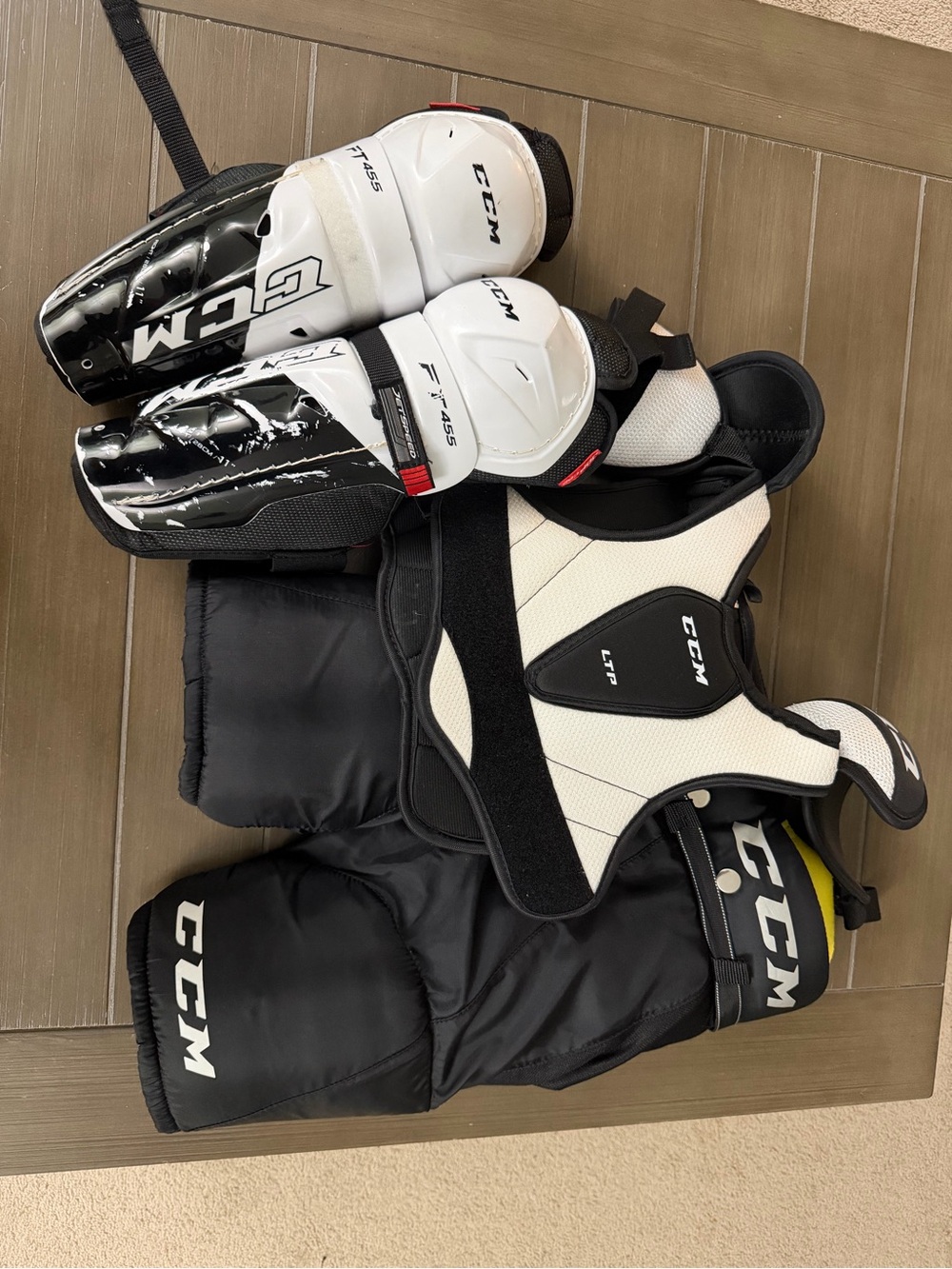 CCM Black and White Youth Hockey Protection Set - Chest, Pants & Shin Guards